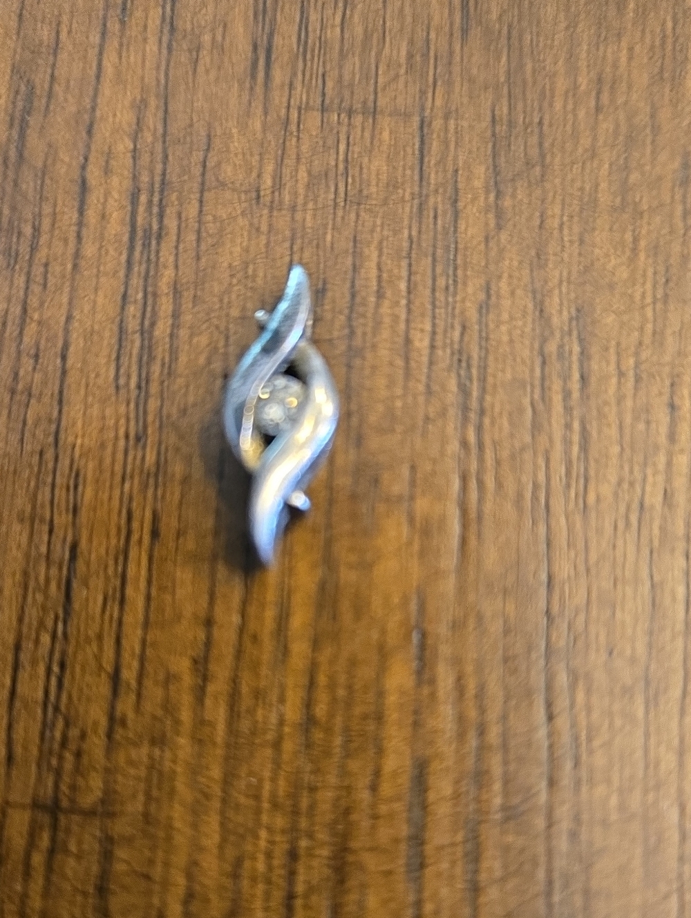 Sterling Silver Twist Leaf Pendant with Diamond